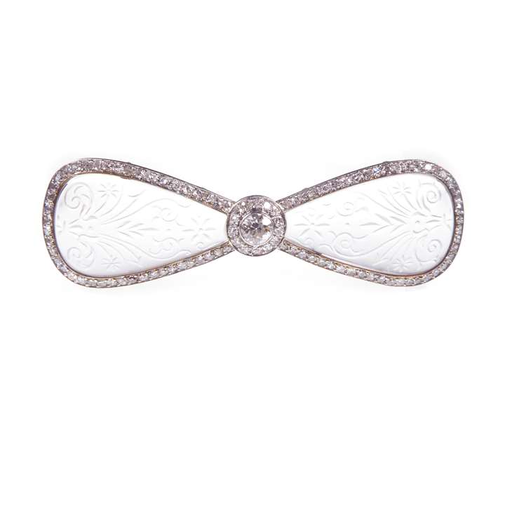 Carved rock crystal and diamond bow brooch